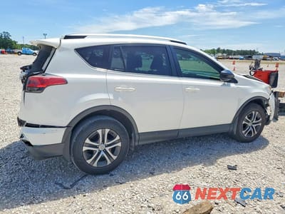 Trzecie zdjęcie samochodu z tyłu: 2018 TOYOTA RAV4 LE VIN:JTMZFREV3JJ156771 - miniatura