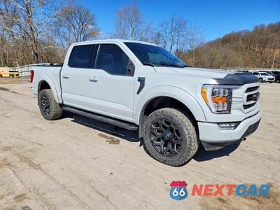 Czwarte zdjęcie samochodu z boku: 2021 FORD F150 SUPERCREW VIN:1FTFW1E58MKD86261 - miniatura