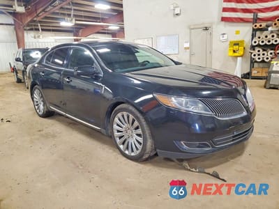 Czwarte zdjęcie samochodu z boku: 2014 LINCOLN MKS VIN:1LNHL9EKXEG604514 - miniatura