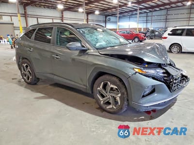 Czwarte zdjęcie samochodu z boku: 2022 HYUNDAI TUCSON SEL VIN:5NMJF3AE5NH140423 - miniatura