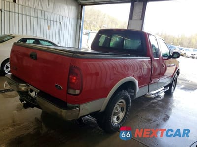 Trzecie zdjęcie samochodu z tyłu: 1999 FORD F150 VIN:2FTRX18W4XCA24628 - miniatura