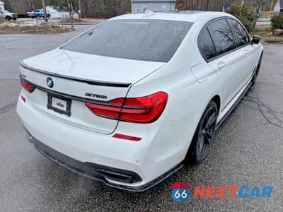 Czwarte zdjęcie samochodu z boku: 2017 BMW 750 XI VIN:WBA7F2C38HG423052 - miniatura