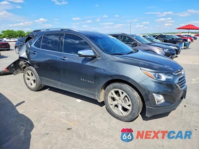 Czwarte zdjęcie samochodu z boku: 2019 CHEVROLET EQUINOX PREMIER VIN:2GNAXNEV5K6258033 - miniatura