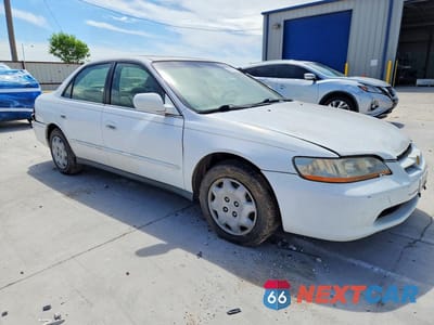 Czwarte zdjęcie samochodu z boku: 1999 HONDA ACCORD LX VIN:JHMCG5645XC007517 - miniatura