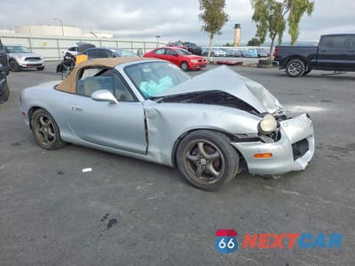 Czwarte zdjęcie samochodu z boku: 2000 MAZDA MX-5 MIATA BASE VIN:JM1NB3534Y0142626 - miniatura
