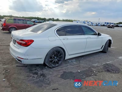 Trzecie zdjęcie samochodu z tyłu: 2019 BMW 740 I VIN:WBA7E2C54KB217719 - miniatura