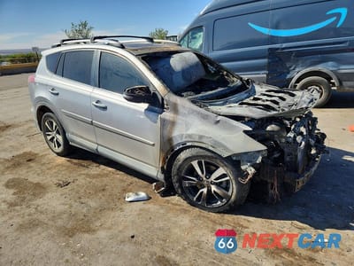 Czwarte zdjęcie samochodu z boku: 2017 TOYOTA RAV4 XLE VIN:2T3RFREV2HW610598 - miniatura