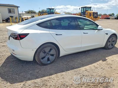 Trzecie zdjęcie samochodu z tyłu: 2023 TESLA MODEL 3 VIN:5YJ3E1EA4PF501314 - miniatura