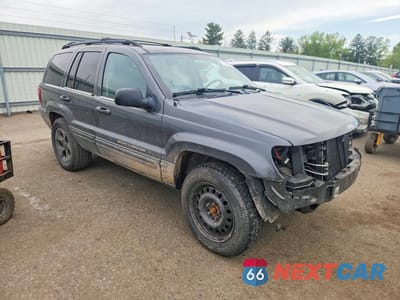 Czwarte zdjęcie samochodu z boku: 2004 JEEP GRAND CHEROKEE LIMITED VIN:1J4GW58N24C383173 - miniatura