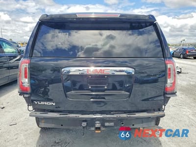 Zdjęcie 6 z 13 samochodu: 2016 GMC YUKON DENALI VIN:1GKS2CKJ6GR397492 - miniatura