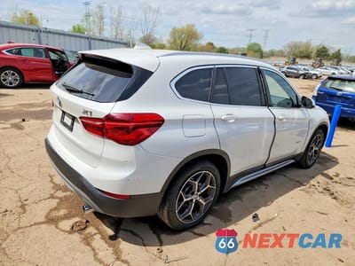 Trzecie zdjęcie samochodu z tyłu: 2017 BMW X1 XDRIVE28I VIN:WBXHT3C34H5F70119 - miniatura