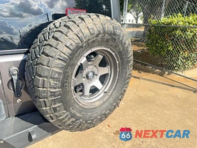 Zdjęcie 12 z 14 samochodu: 2014 JEEP WRANGLER UNLIMITED SPORT VIN:1C4BJWDG2EL244139 - miniatura