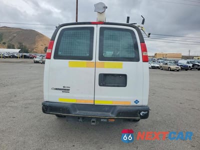 Zdjęcie 6 z 14 samochodu: 2013 CHEVROLET EXPRESS 2500 CARGO UTILITY / SERVICE VAN VIN:1GCWGFCB2D1902493 - miniatura