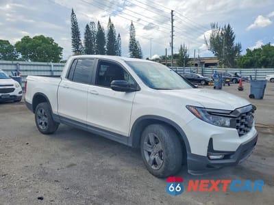Czwarte zdjęcie samochodu z boku: 2024 HONDA RIDGELINE TRAIL SPORT VIN:5FPYK3F69RB030937 - miniatura