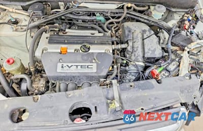 Zdjęcie 12 z 14 samochodu: 2002 HONDA CR-V LX VIN:JHLRD68452C000280 - miniatura