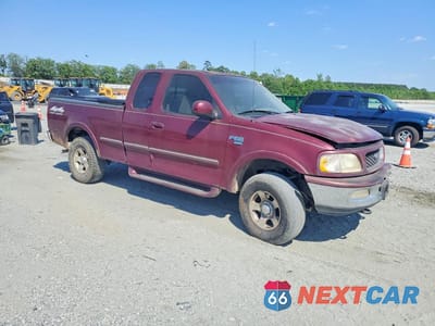 Czwarte zdjęcie samochodu z boku: 1998 FORD F150 VIN:1FTRX18LXWNB73186 - miniatura
