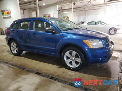 Czwarte zdjęcie samochodu z boku: 2010 DODGE CALIBER MAINSTREET VIN:1B3CB3HA5AD565393 - miniatura