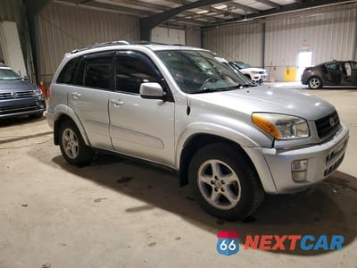 Czwarte zdjęcie samochodu z boku: 2002 TOYOTA RAV4 BASE VIN:JTEHH20V426038619 - miniatura