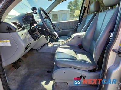Zdjęcie 7 z 13 samochodu: 2005 MERCEDES-BENZ ML 500 VIN:4JGAB75E15A559596 - miniatura