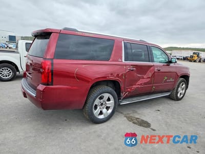 Trzecie zdjęcie samochodu z tyłu: 2016 CHEVROLET SUBURBAN K1500 LTZ VIN:1GNSKJKC0GR328435 - miniatura
