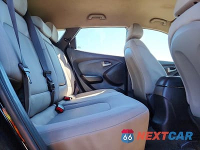 Zdjęcie 11 z 12 samochodu: 2011 HYUNDAI TUCSON GL VIN:KM8JT3ABXBU229421 - miniatura