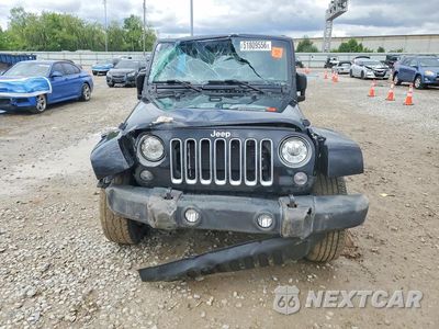 Piąte zdjęcie samochodu w środku: 2017 JEEP WRANGLER UNLIMITED SAHARA VIN:1C4BJWEG5HL515519 - miniatura