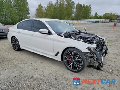 Czwarte zdjęcie samochodu z boku: 2022 BMW M550XI VIN:WBA13BK04NCJ66237 - miniatura