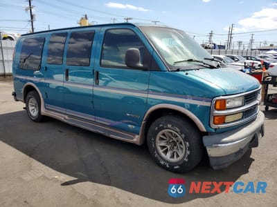 Czwarte zdjęcie samochodu z boku: 1999 CHEVROLET EXPRESS G1500 VIN:1GBFG15R7X1024095 - miniatura