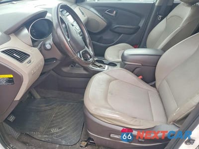 Zdjęcie 7 z 13 samochodu: 2014 HYUNDAI TUCSON VIN:KM8JUCAG6EU793466 - miniatura