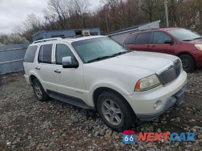 Czwarte zdjęcie samochodu z boku: 2004 LINCOLN TOWNHOUSE AVIATOR VIN:5LMEU88H24ZJ44887 - miniatura