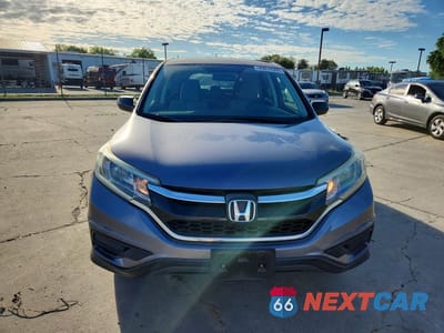 Piąte zdjęcie samochodu w środku: 2015 HONDA CR-V LX VIN:3CZRM3H39FG700495 - miniatura