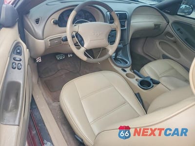 Zdjęcie 8 z 13 samochodu: 2004 FORD MUSTANG VIN:1FAFP40694F150408 - miniatura