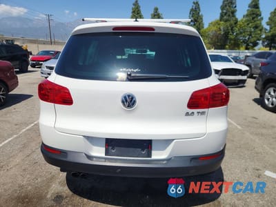 Zdjęcie 6 z 12 samochodu: 2014 VOLKSWAGEN TIGUAN S VIN:WVGAV3AX4EW550496 - miniatura