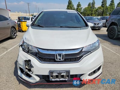 Piąte zdjęcie samochodu w środku: 2019 HONDA FIT SPORT VIN:3HGGK5H6XKM742857 - miniatura