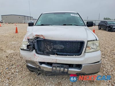 Piąte zdjęcie samochodu w środku: 2004 FORD F150 VIN:1FTRX12W84NA98052 - miniatura