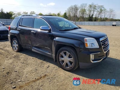 Czwarte zdjęcie samochodu z boku: 2017 GMC TERRAIN SLT VIN:2GKFLUEK6H6335659 - miniatura