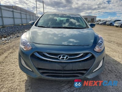 Piąte zdjęcie samochodu w środku: 2013 HYUNDAI ELANTRA GT BASE VIN:KMHD35LE0DU039288 - miniatura