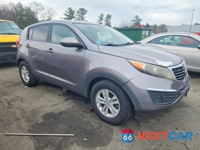 Czwarte zdjęcie samochodu z boku: 2011 KIA SPORTAGE VIN:KNDPBCA21B7074922 - miniatura