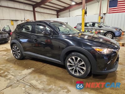 Czwarte zdjęcie samochodu z boku: 2019 MAZDA CX-3 TOURING VIN:JM1DKFC7XK0404241 - miniatura
