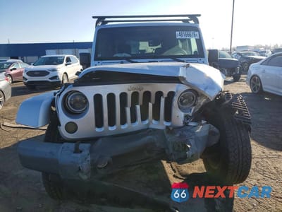 Piąte zdjęcie samochodu w środku: 2009 JEEP WRANGLER SAHARA VIN:1J4FA54119L701529 - miniatura
