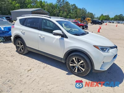 Czwarte zdjęcie samochodu z boku: 2016 TOYOTA RAV4 XLE VIN:JTMWFREV1GD082633 - miniatura