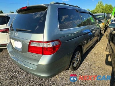 Czwarte zdjęcie samochodu z boku: 2005 HONDA ODYSSEY EX VIN:5FNRL38425B085634 - miniatura