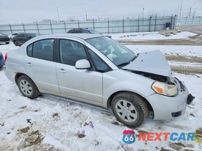Czwarte zdjęcie samochodu z boku: 2011 SUZUKI SX4 LE VIN:JS2YC5A2XB6300108 - miniatura
