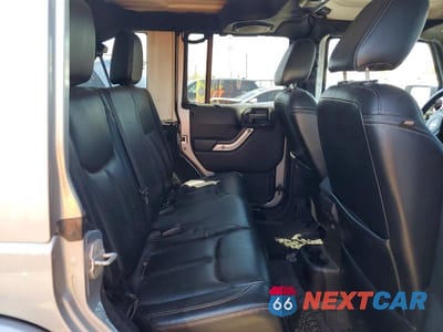Zdjęcie 10 z 12 samochodu: 2013 JEEP WRANGLER UNLIMITED SAHARA VIN:1C4HJWEG0DL678258 - miniatura
