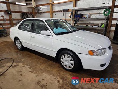 Czwarte zdjęcie samochodu z boku: 2001 TOYOTA COROLLA LE VIN:1NXBR12E31Z536282 - miniatura