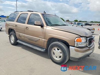 Czwarte zdjęcie samochodu z boku: 2003 GMC YUKON VIN:1GKEC13Z73R123795 - miniatura