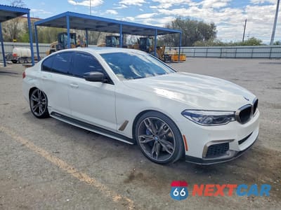 Czwarte zdjęcie samochodu z boku: 2019 BMW M550XI VIN:WBAJB9C54KB464133 - miniatura