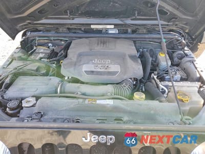 Zdjęcie 12 z 13 samochodu: 2013 JEEP WRANGLER SPORT VIN:1C4AJWAG8DL530401 - miniatura