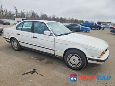 Czwarte zdjęcie samochodu z boku: 1990 BMW 525 I VIN:WBAHC1317LBC93599 - miniatura