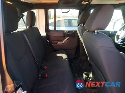 Zdjęcie 10 z 13 samochodu: 2015 JEEP WRANGLER UNLIMITED SPORT VIN:1C4BJWDG9FL657449 - miniatura